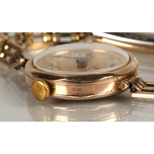 112 - Rolex ladies vintage 9ct gold wrist watch on a rolled gold and stainless steel strap.