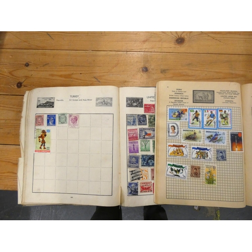 114 - Three world stamp albums USA, New Zealand etc.