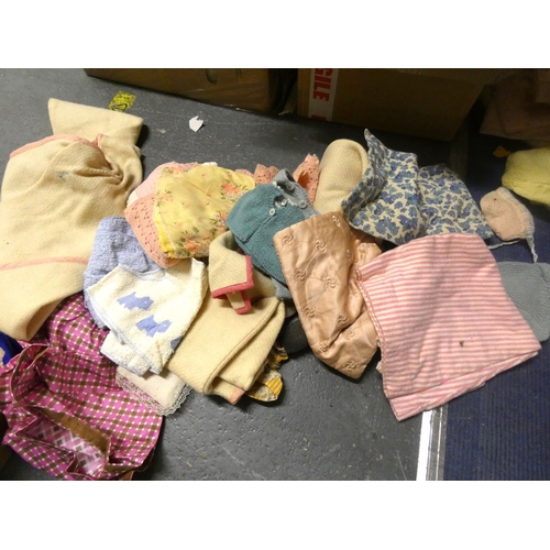 216 - Collection of doll's clothes and a baby's blanket