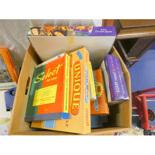 236 - Large box of vintage jigsaws.