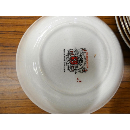 245 - Woods & Sons Burgundy dinner service.