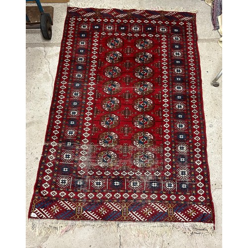 608 - Eastern-style floor rug, 185cm x 124cm