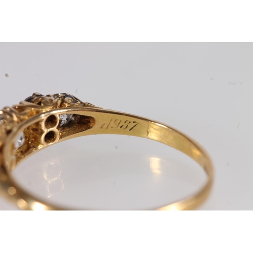 130 - Edwardian 18ct gold and seven diamond ring, the seven round cut graduating stones approximately 0.9 ... 