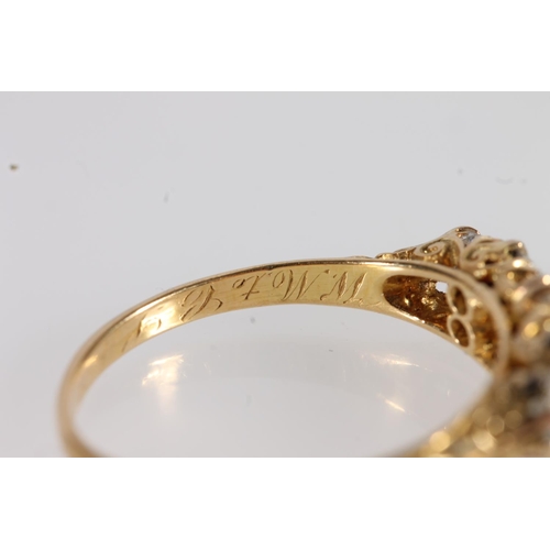 130 - Edwardian 18ct gold and seven diamond ring, the seven round cut graduating stones approximately 0.9 ... 