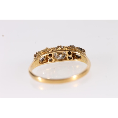 130 - Edwardian 18ct gold and seven diamond ring, the seven round cut graduating stones approximately 0.9 ... 