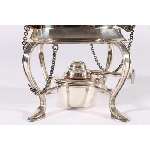 13 - George V silver spirit kettle, of typical shape, the turned wooden handle and finial over a shaped b... 