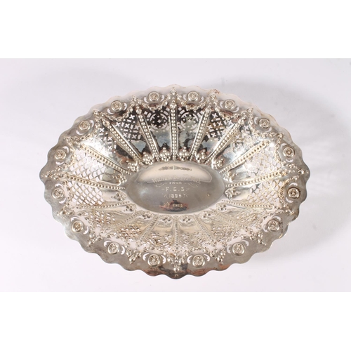 16 - Victorian silver basket form bowl, the oval bowl with wavy rim over a pierced and embossed interior,... 