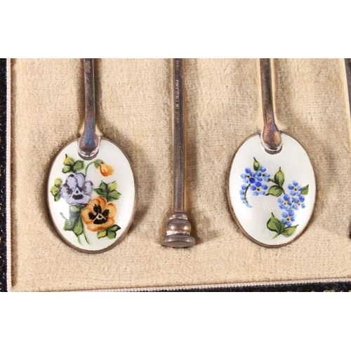 17 - Set of six Elizabeth II silver and enamel coffee spoons, the bowls decorated to the rear with spring... 