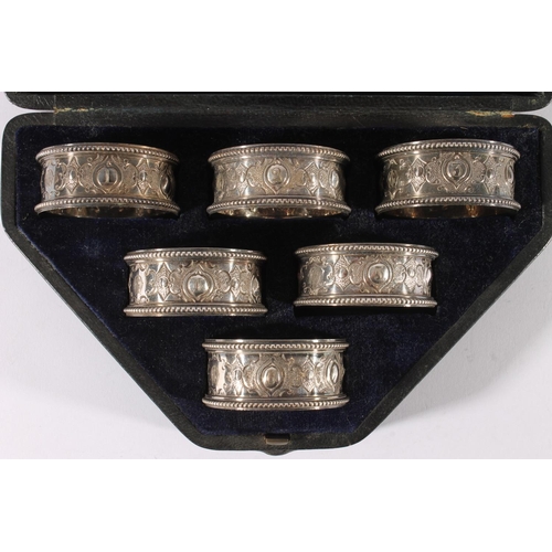 20 - Set of six Victorian white metal napkin rings, numbered 1 to 6, in fitted case.