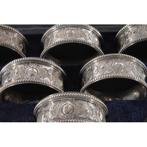 20 - Set of six Victorian white metal napkin rings, numbered 1 to 6, in fitted case.