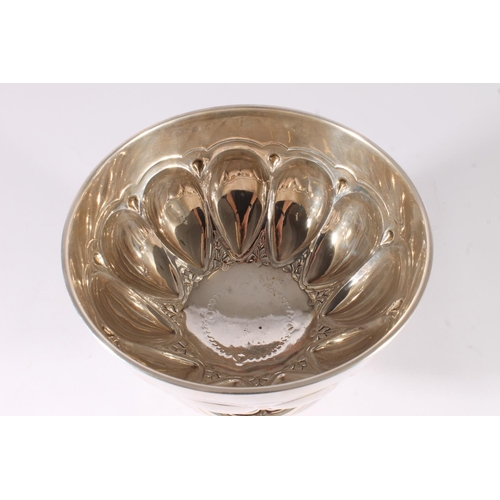 23 - Edwardian silver pedestal rose bowl, the body with embossed egg and dart decoration raised on round ... 