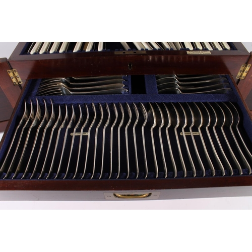 25 - George V oak cased canteen of silver plated cutlery for twelve, housed within Wellington type two-dr... 