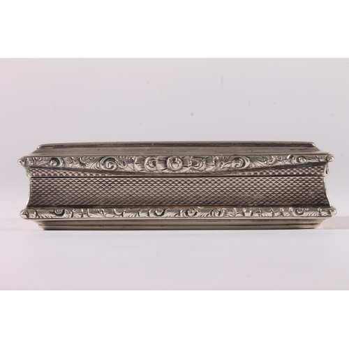 27 - William IV silver snuff box, of rectangular shape with engine turned decoration and floral cast thum... 