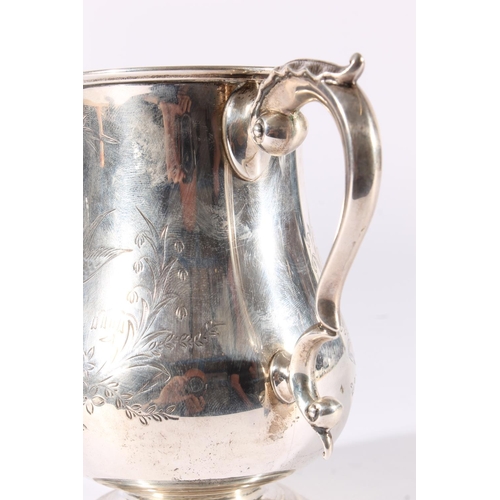 29 - Victorian silver tankard of baluster form, the S-scroll handle cast with an acanthus leaf thumb piec... 