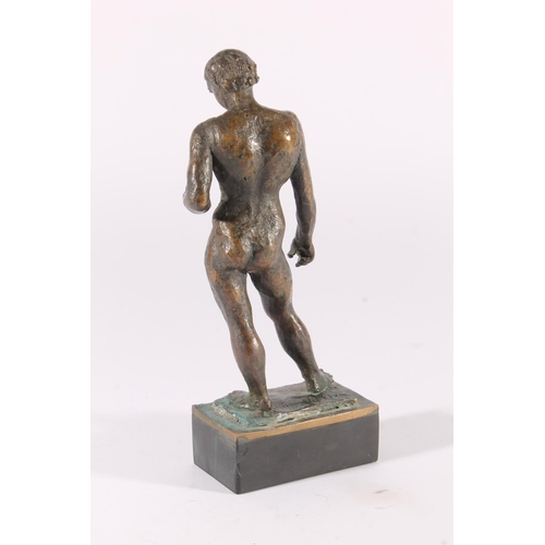 406 - Modernist bronze sculpture of a naked young man, mid 20th century, the standing figure on square pli... 