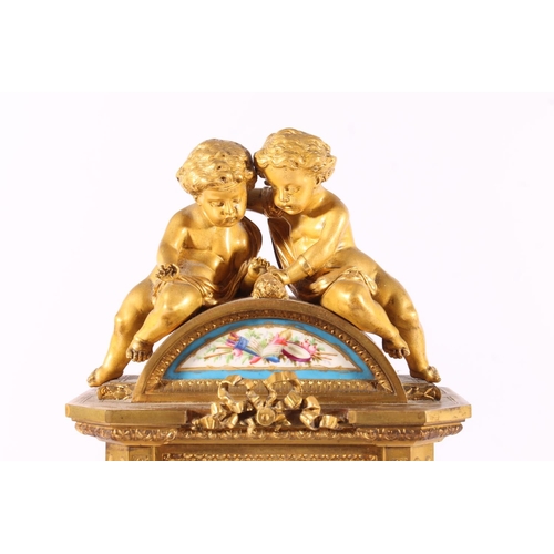 410 - French gilt metal and porcelain mantel clock, 19th century, surmounted by two putti over dome enamel... 