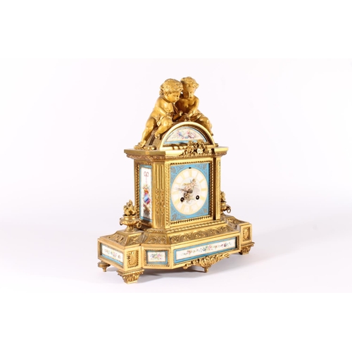 410 - French gilt metal and porcelain mantel clock, 19th century, surmounted by two putti over dome enamel... 