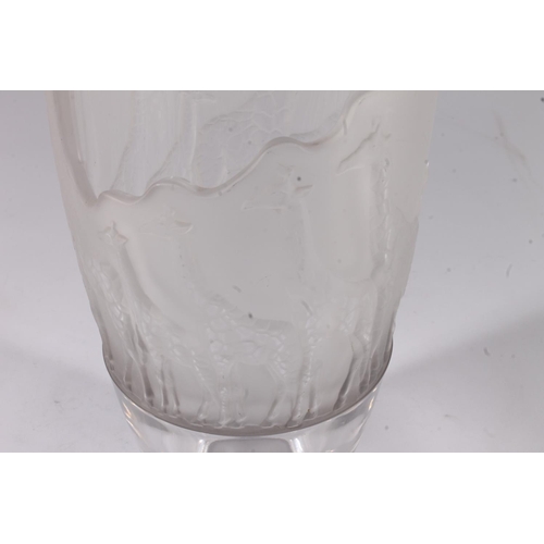 437 - Nachtmann clear and frosted abtsract glass vase, decorated in relief with a giraffe herd, H27cm.&nbs... 