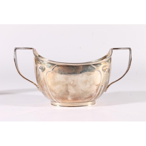 7 - George V silver sugar bowl and milk jug, of a secessionist Art Nouveau design on tapering bodies wit... 