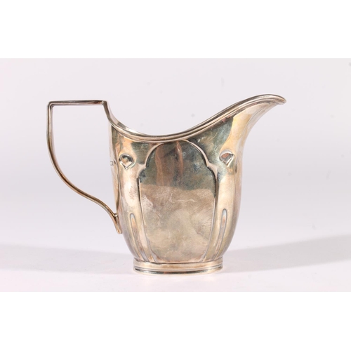 7 - George V silver sugar bowl and milk jug, of a secessionist Art Nouveau design on tapering bodies wit... 