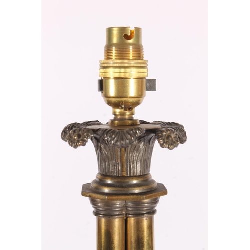 420 - Victorian bronze table lamp, the quadripartite gilt column raised on an octagonal pedestal base term... 