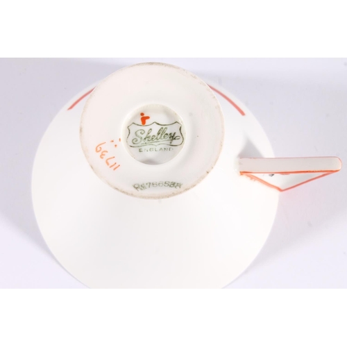 445 - Shelley Art Deco 'J' pattern trio, c1930s, the Eve shaped cup, side plate and saucer decorated with ... 