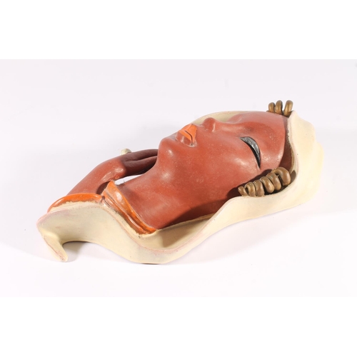 448 - Goldscheider Art Deco painted terracotta wall mask, c1930s, in the form of a hooded woman, printed m... 