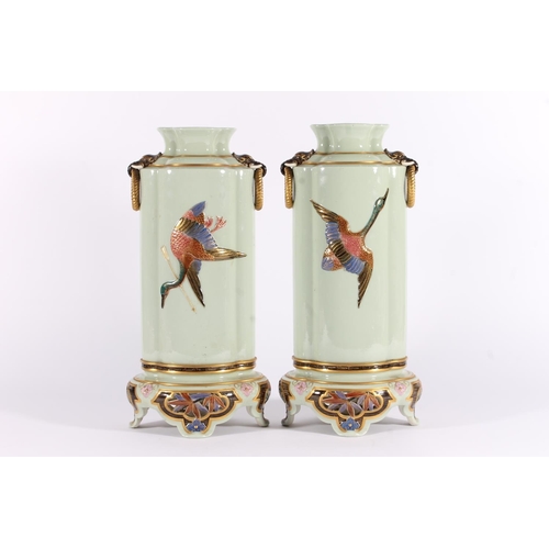 450 - Pair of Royal Worcester Aesthetic period vases, c1882, of Chinoserie shape on pedestal foot, the cel... 