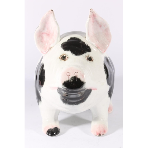 454 - Wemyss Pottery pig, sponge decorated in patches of black with pink highlights, marked to base 'Wemys... 