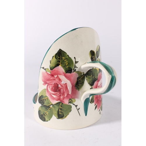 457 - Wemyss cabbage rose decorated pottery chamberstick, pen stand and a apple decorated beaker, max H14c... 