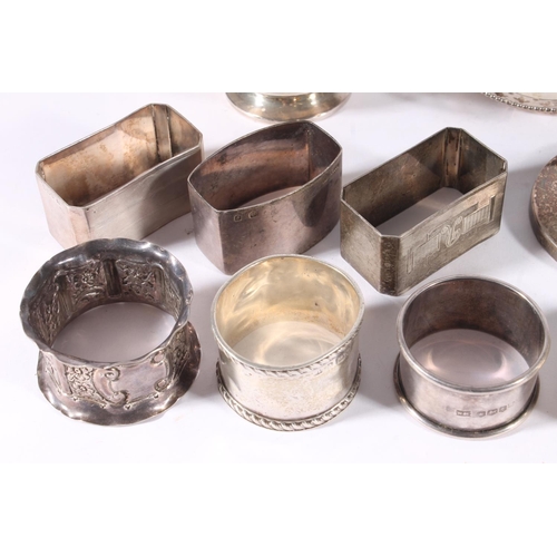 76 - Pair of Art Deco style silver napkin rings of rectangular shape with canted corners, hallmarked for ... 