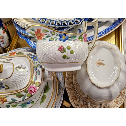 307 - A 19th century twin handled sauce tureen, similar plates also a collection of blue and white.