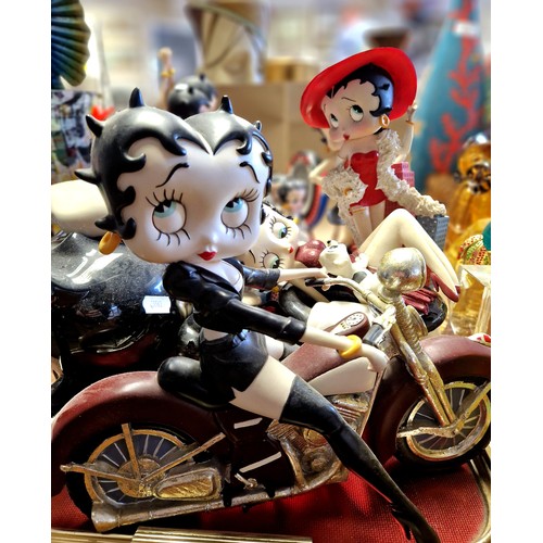 314 - A collection of Betty Boop figures and memorabilia to include waitress, dancer, motor cyclist, teapo... 