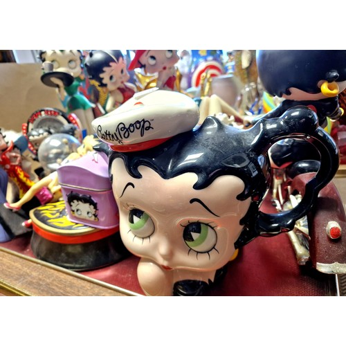 314 - A collection of Betty Boop figures and memorabilia to include waitress, dancer, motor cyclist, teapo... 