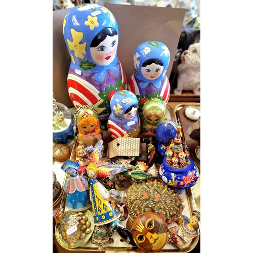 319 - Graduated set of three Russian doll ceramic ornaments, tin Russian doll toys, bejewelled trinket box... 