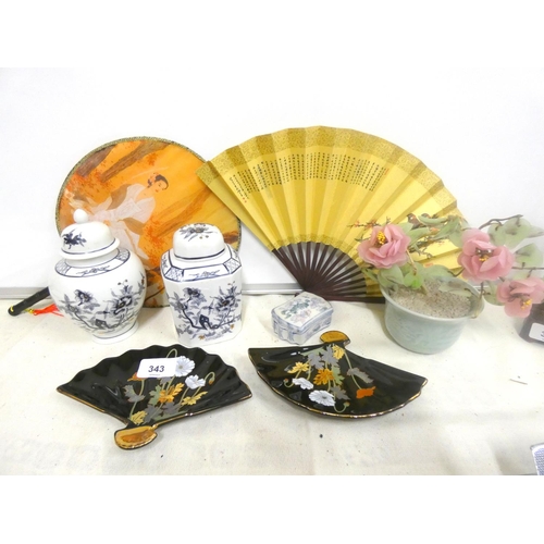 311 - Collection of modern Oriental ware to include fans, urns etc.