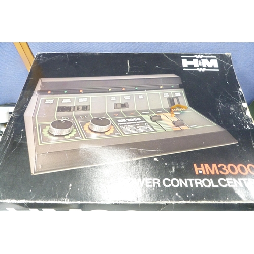 10 - HM3000 power control centre, two Tri-ang power units and a boxed Duette dual control unit.