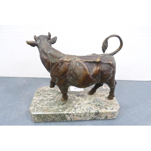 108 - Cast bronze figure of a cow, after the original, on a polished plinth base.