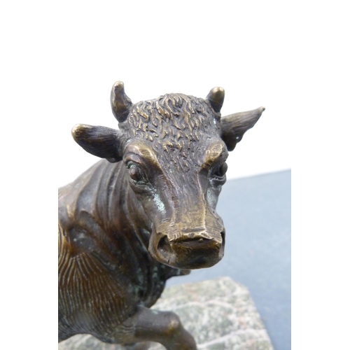 108 - Cast bronze figure of a cow, after the original, on a polished plinth base.