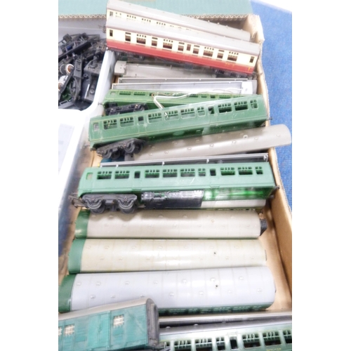 11 - Two cartons containing 00 gauge parts to include coaches, bogeys, loco parts, wheels, boxed Wrenn Ra... 