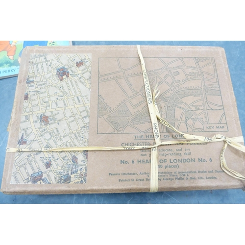 111 - Carton containing prints of game birds, embroidered floral prints, London jigsaw etc.