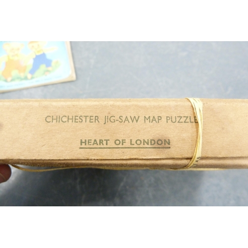 111 - Carton containing prints of game birds, embroidered floral prints, London jigsaw etc.