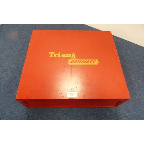 12 - Tri-ang Railways red-painted box containing 00 gauge accessories to include lever frame section, ele... 