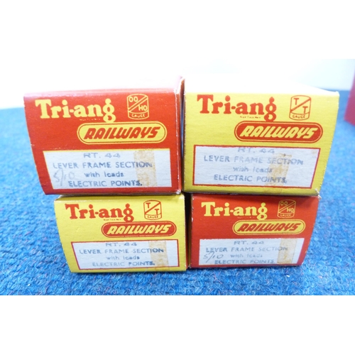 12 - Tri-ang Railways red-painted box containing 00 gauge accessories to include lever frame section, ele... 