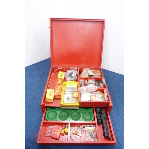 12 - Tri-ang Railways red-painted box containing 00 gauge accessories to include lever frame section, ele... 