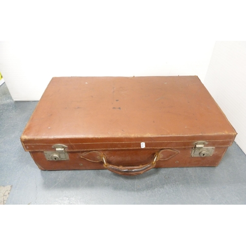 129 - Two vintage suitcases, one with brass locks.  (2)