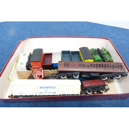 13 - Collection of 00 gauge rolling stock to include tankers, locos, coaches, parts, accessories etc., al... 