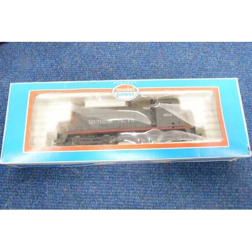 13 - Collection of 00 gauge rolling stock to include tankers, locos, coaches, parts, accessories etc., al... 