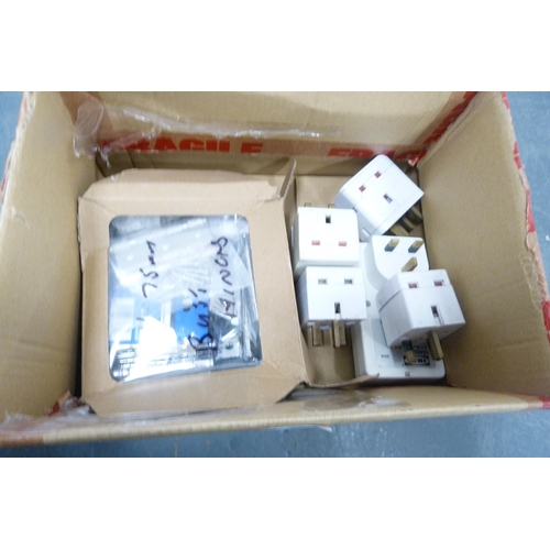 132 - Carton containing assorted plugs, sockets and hinges.