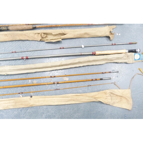 135 - Group of fishing rods to include split cane examples, Edgar Sealey rod in canvas bag, two and three-... 